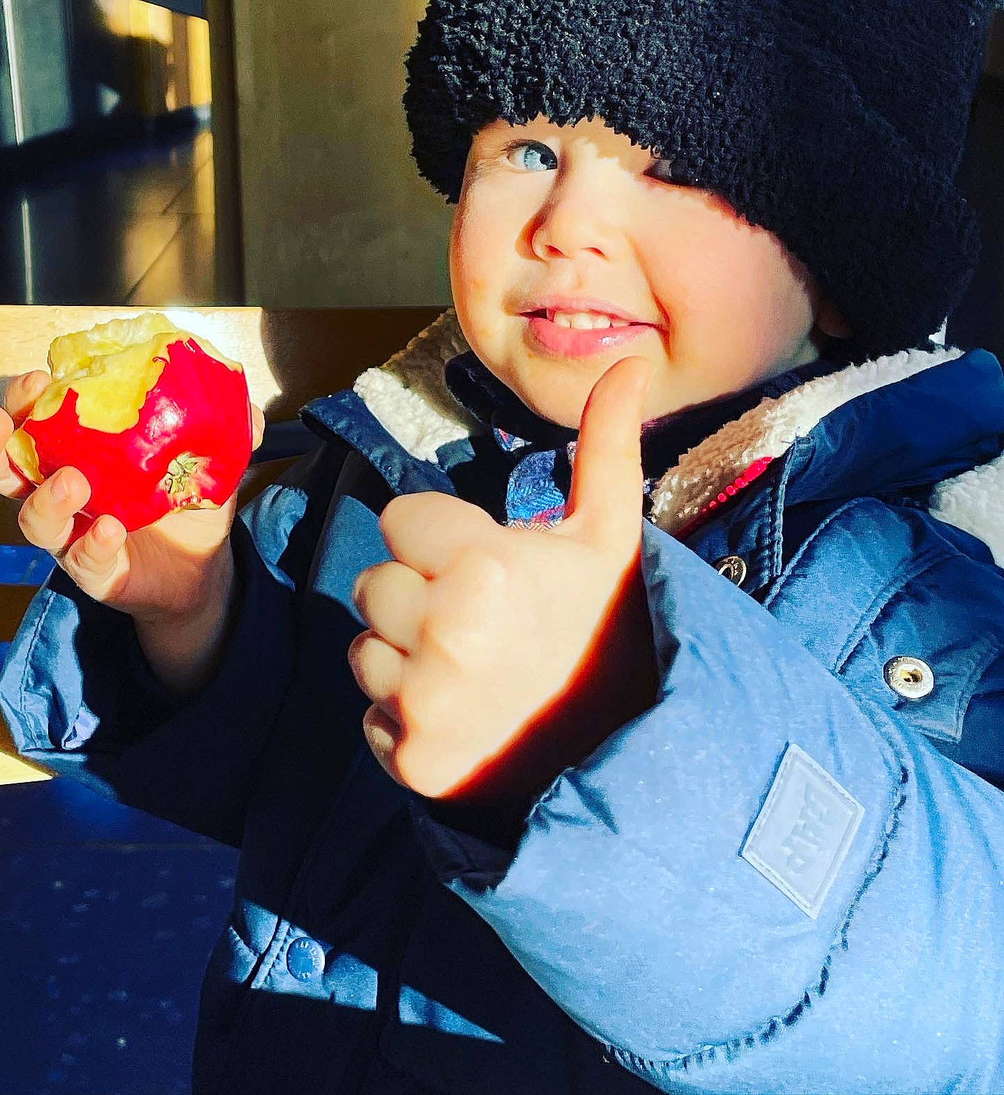 Maverick is registered to the contest to win money with this photo: cap, child, cool, electric_blue, eye, finger, fun, gesture, happy, hat, headwear, knit_cap, nail, person, photograph, red, sleeve, smile, snapshot, thumb