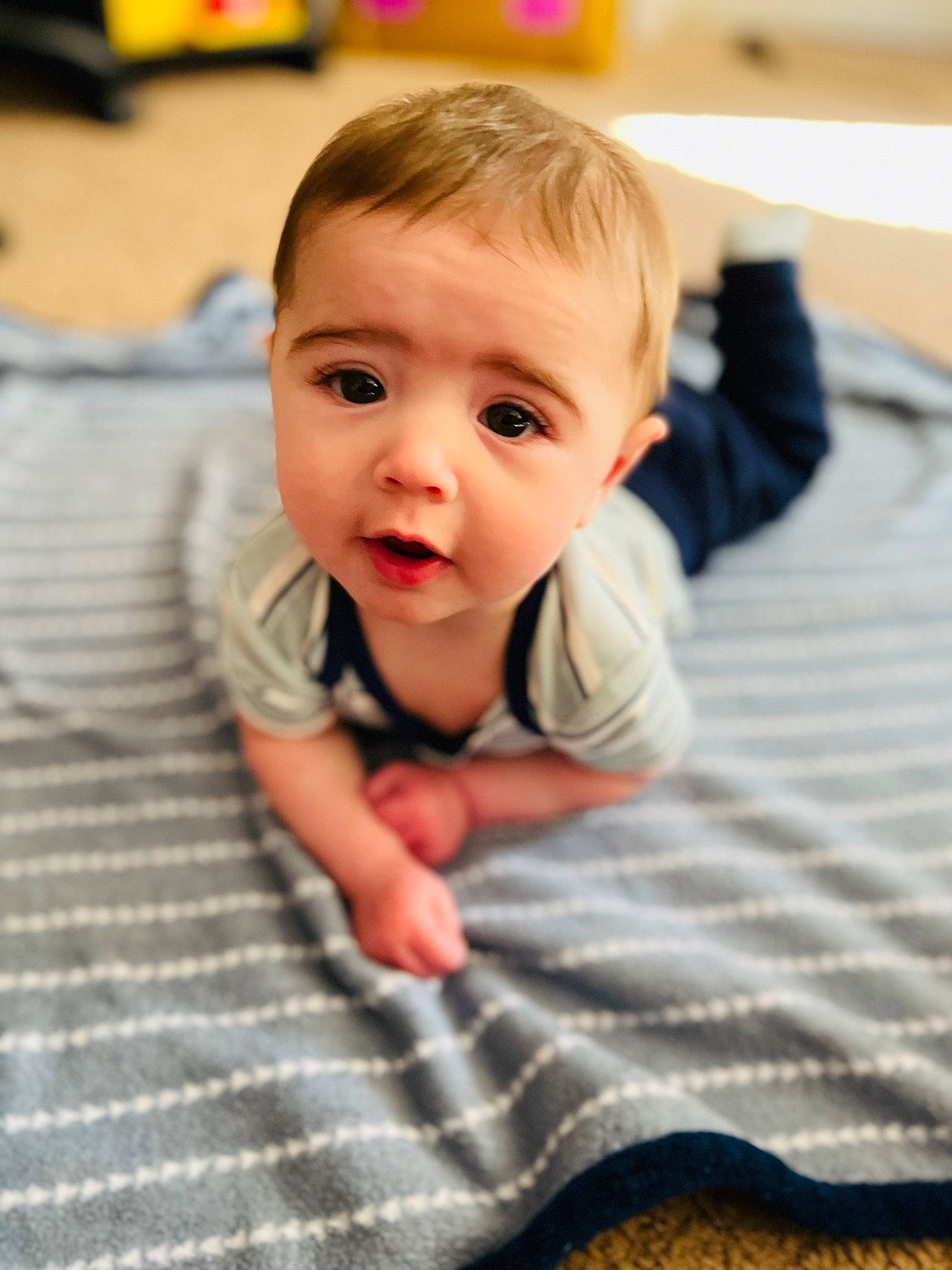 Declan joined the competition — help win amazing prizes! baby, baby_toddler_clothing, cheek, chin, comfort, eye, face, flash_photography, floor, flooring, happy, hardwood, head, iris, nose, person, skin, sleeve, smile, toddler