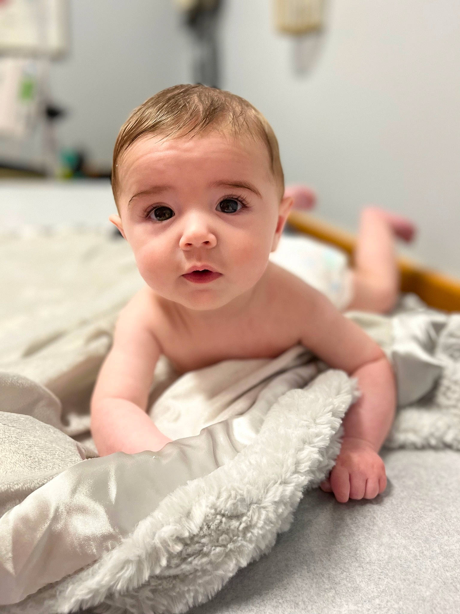 Declan joined the competition — help win amazing prizes! baby, baby_toddler_clothing, bathing, cheek, child, comfort, facial_expression, fashion_accessory, flash_photography, floor, flooring, fun, happy, iris, linens, person, portrait_photography, room, sitting, skin