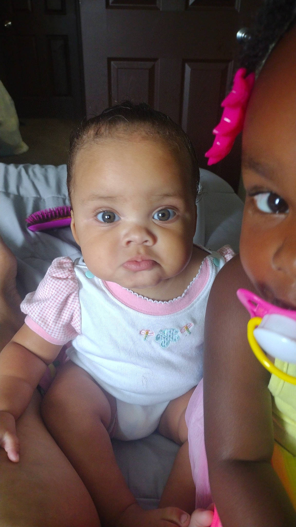 Dejanae is registered to the contest to win money with this photo: baby, baby_toddler_clothing, cheek, chin, eye, face, facial_expression, hairstyle, happy, head, iris, lip, mouth, neck, nose, organ, person, pink, product, skin