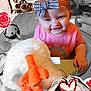 baby, child, smiling, bow, headband, pink_shirt, plush_toy, stuffed_animal, orange, white, indoor, floor, toy, hands, face, person, vintage_telephone, collage, heart, rose