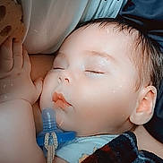 Yovani joined the competition — help win amazing prizes! baby, sleeping, pacifier, blanket, hand, face, infant, closeup, cute, peaceful, soft_light, indoors, child, adorable, resting, skin, head, expression, comfort, love