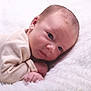 Emrys participe au concours pour gagner de l'argent avec cette photo : baby, blanket, bodypart, face, finger, hand, happy, head, newborn, person, photography, portrait, smile