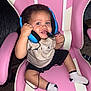 Aceson joined the competition — help win amazing prizes! beige_shirt, black_shorts, casual_clothing, child, curly_hair, cute, footwear, gaming_headset, happy, headphones, indoor, microphone, modern, person, pink_chair, seat, smiling, technology, toddler, white_socks