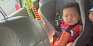 Aceson joined the competition — help win amazing prizes! black_car_seat, bottle, car_interior, car_seat, child, curly_hair, daylight, headrest, infant, peaceful, red_clothing, resting, safety, seat, seatbelt, sleeping, toddler, toy, travel, window