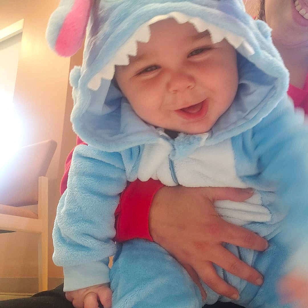Tommy joined the competition — help win amazing prizes! baby, baby_products, blue, bonnet, cheek, child, cool, eye, facial_expression, happy, head, headgear, headwear, laugh, person, pink, product, skin, smile, toddler