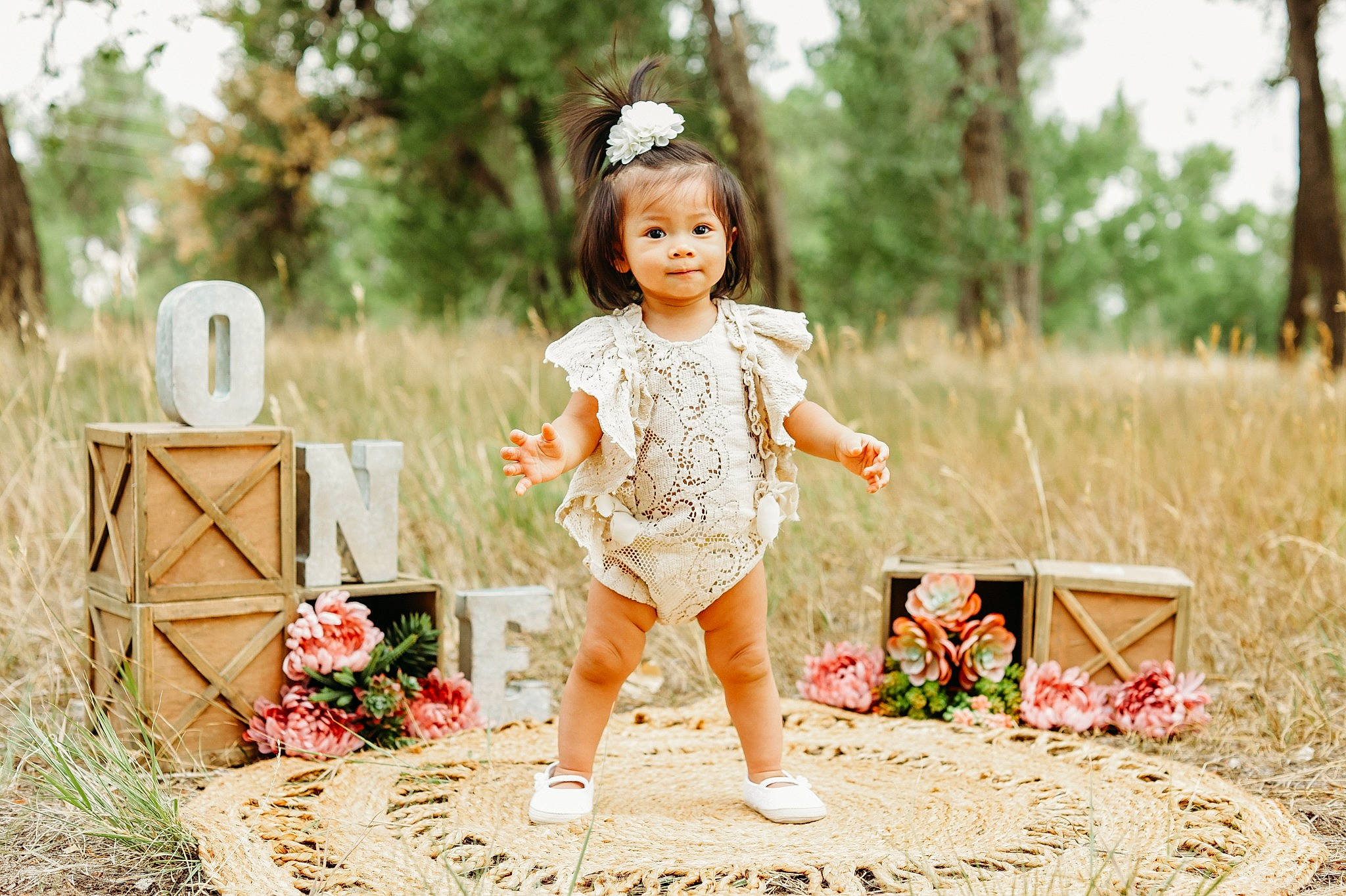 Lana is registered to the contest to win money with this photo: baby, baby_toddler_clothing, child, dress, fawn, fun, grass, happy, leisure, pattern, peach, people_in_nature, person, plant, portrait_photography, recreation, sitting, sleeve, smile, toddler