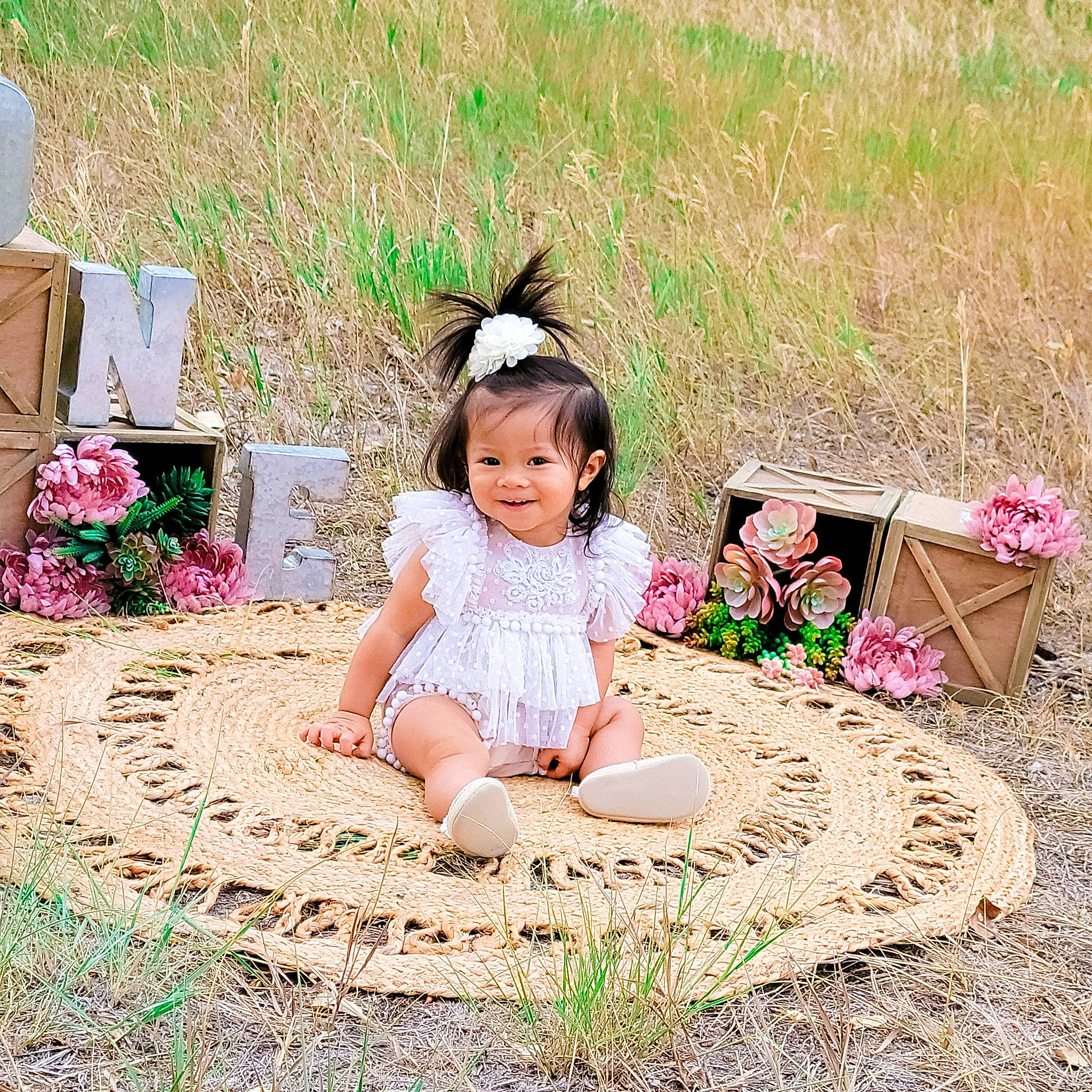 Lana is registered to the contest to win money with this photo: adaptation, baby, baby_toddler_clothing, botany, child, dress, event, eye, fun, grass, grass_family, happy, joy, leisure, nature, people, people_in_nature, person, pink, plant