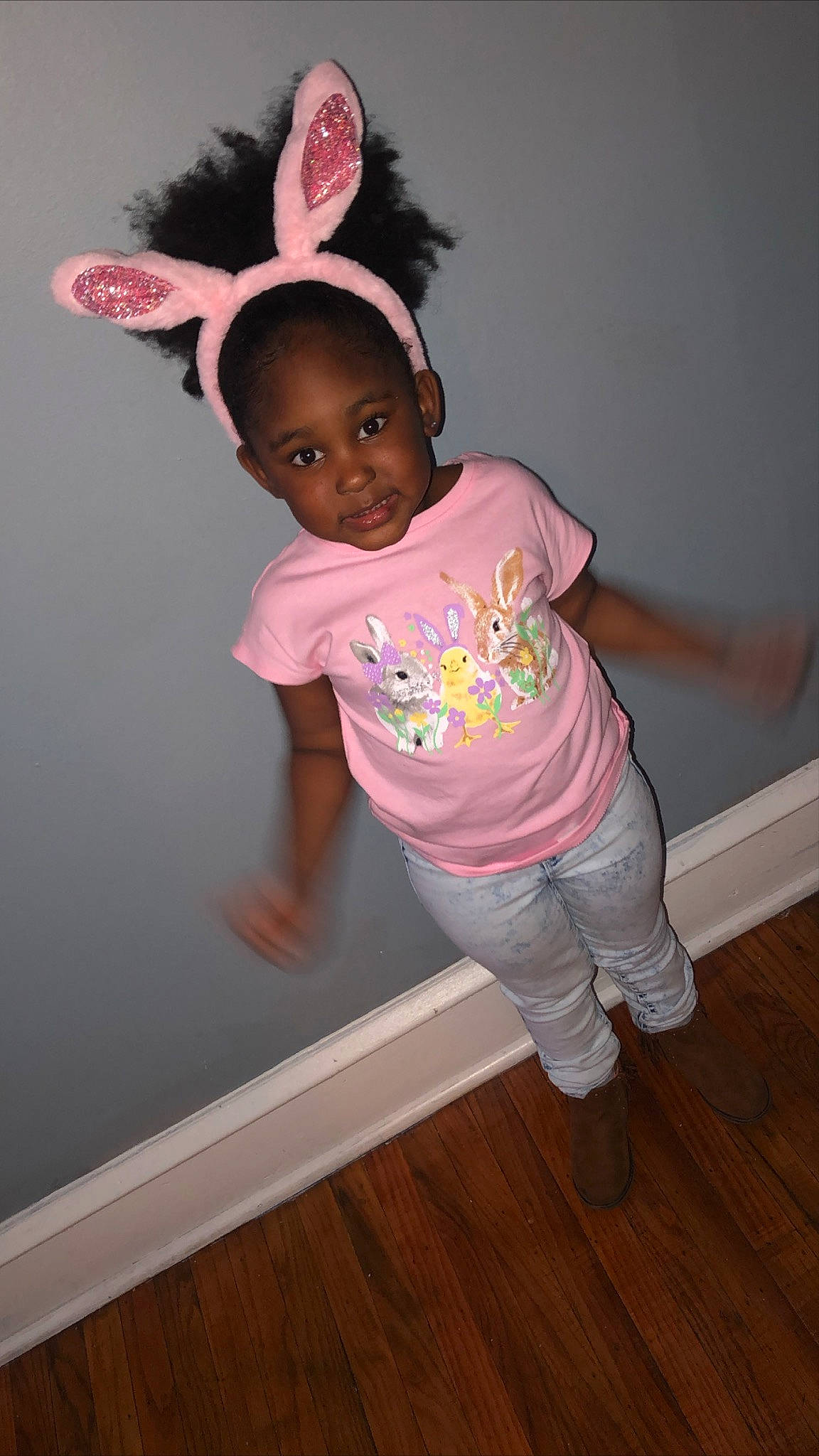 Zaniyah joined the competition — help win amazing prizes! baby, baby_products, baby_toddler_clothing, child, costume_hat, flooring, fun, happy, hardwood, hat, human_body, human_leg, magenta, person, pink, room, sleeve, t_shirt, toddler, wood