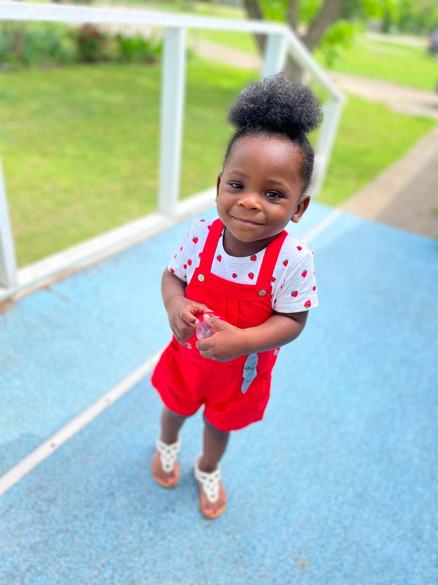 Penelope joined the competition — help win amazing prizes! asphalt, baby, baby_toddler_clothing, child, flooring, fun, grass, hair, happy, joy, knee, leisure, person, plant, recreation, sandal, shoe, shorts, smile, sneakers