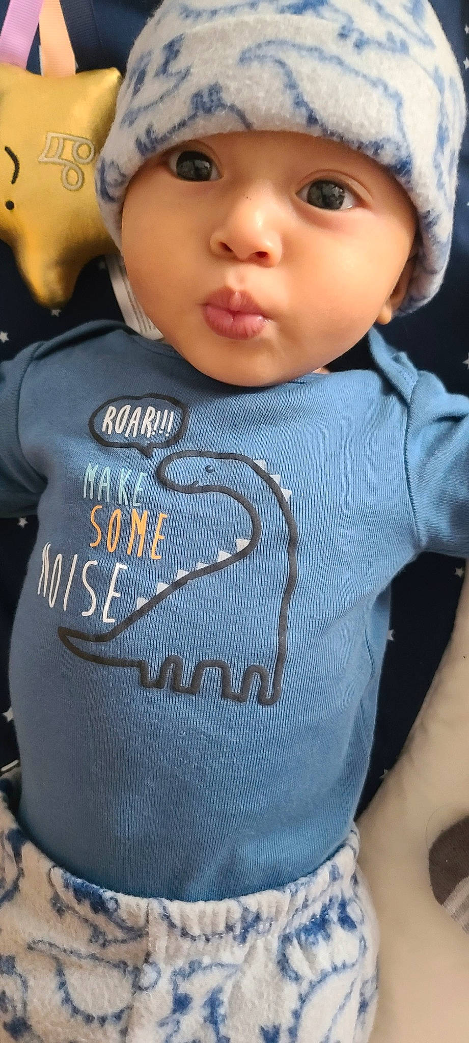 Legacy is registered to the contest to win money with this photo: autograph, baby, baby_toddler_clothing, chest, cool, denim, electric_blue, fashion_accessory, font, happy, headwear, neck, organ, outerwear, pattern, person, personal_protective_equipment, sleeve, sportswear, t_shirt