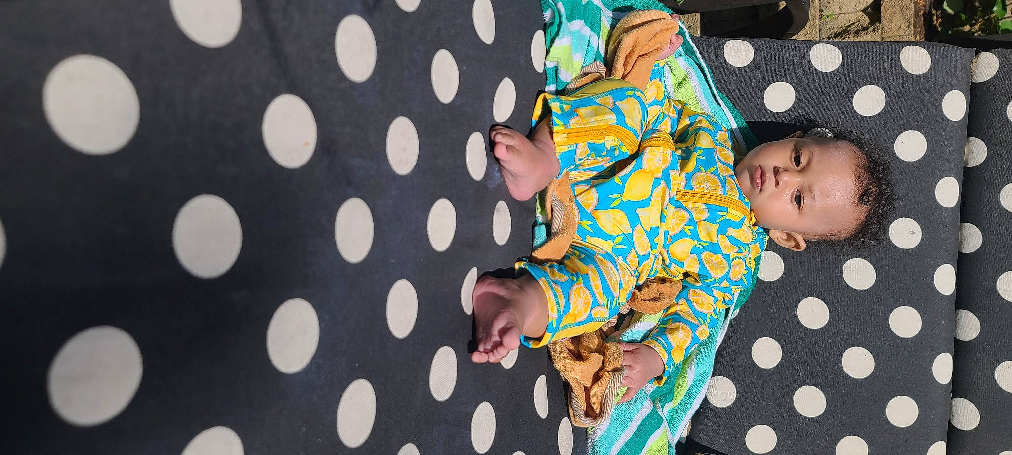 Legacy is registered to the contest to win money with this photo: baby, baby_toddler_clothing, child, circle, comfort, entertainment, event, fun, happy, leisure, linens, pattern, performing_arts, person, play, polka_dot, sleeve, t_shirt, textile, thigh