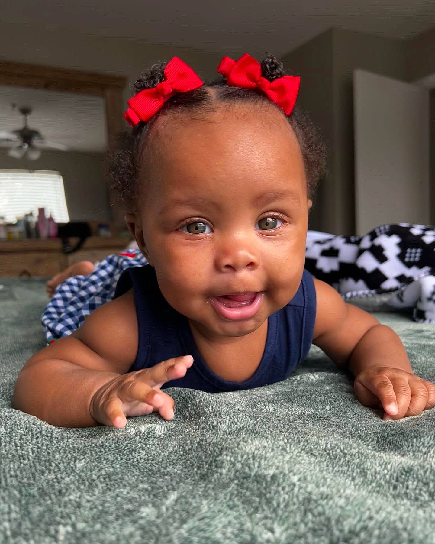 Demi is registered to the contest to win money with this photo: baby, baby_toddler_clothing, black_hair, cheek, child, crawling, eyebrow, facial_expression, flash_photography, flooring, fun, grass, happy, lip, mouth, nose, person, picture_frame, skin, smile