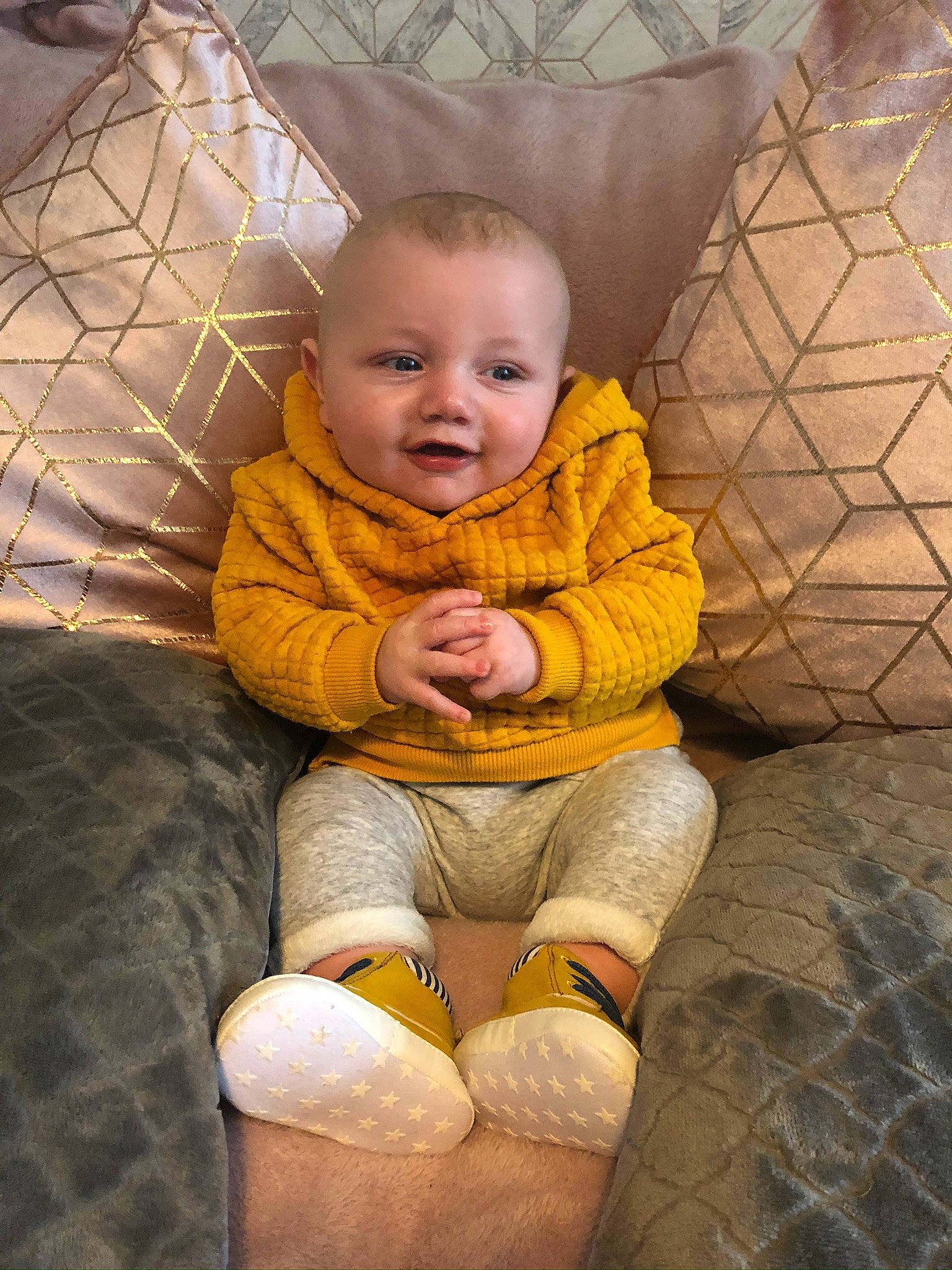 Zack is registered to the contest to win money with this photo: baby, cheek, child, eye, person, sitting, skin, toddler, yellow