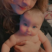 River is registered to the contest to win money with this photo: baby, child, person, face, smile, hug, diaper, skin, hair, piercing, adult, portrait, indoor, closeup, expression, affection, holding, young, candid, warmth