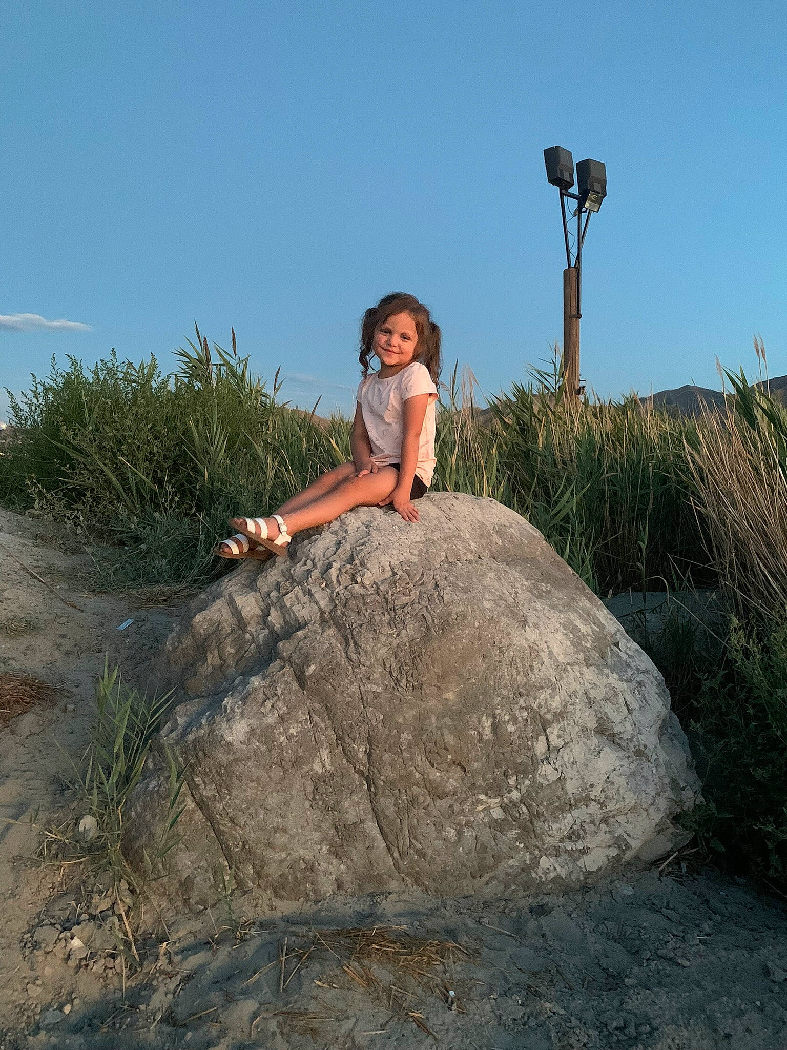 Arianni joined the competition — help win amazing prizes! bedrock, ecoregion, flash_photography, fun, grass, grass_family, grassland, happy, joy, landscape, leisure, outcrop, people_in_nature, person, plant, rock, sky, slope, soil, street_light