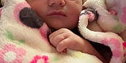 Sariah joined the competition — help win amazing prizes! baby, blanket, closeup, comfort, cozy, cute, face, floral_pattern, hand, indoors, infant, newborn, peaceful, person, resting, skin, sleeping, soft_texture, tender, wrapped