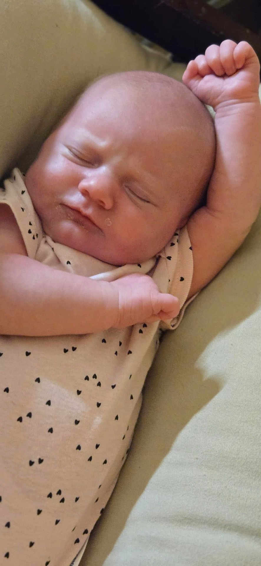 Sariah joined the competition — help win amazing prizes! baby, sleeping, infant, arm, face, peaceful, cushion, clothing, heart_pattern, skin, cute, resting, newborn, person, indoors, soft, closeup, expression, relaxation, comfort