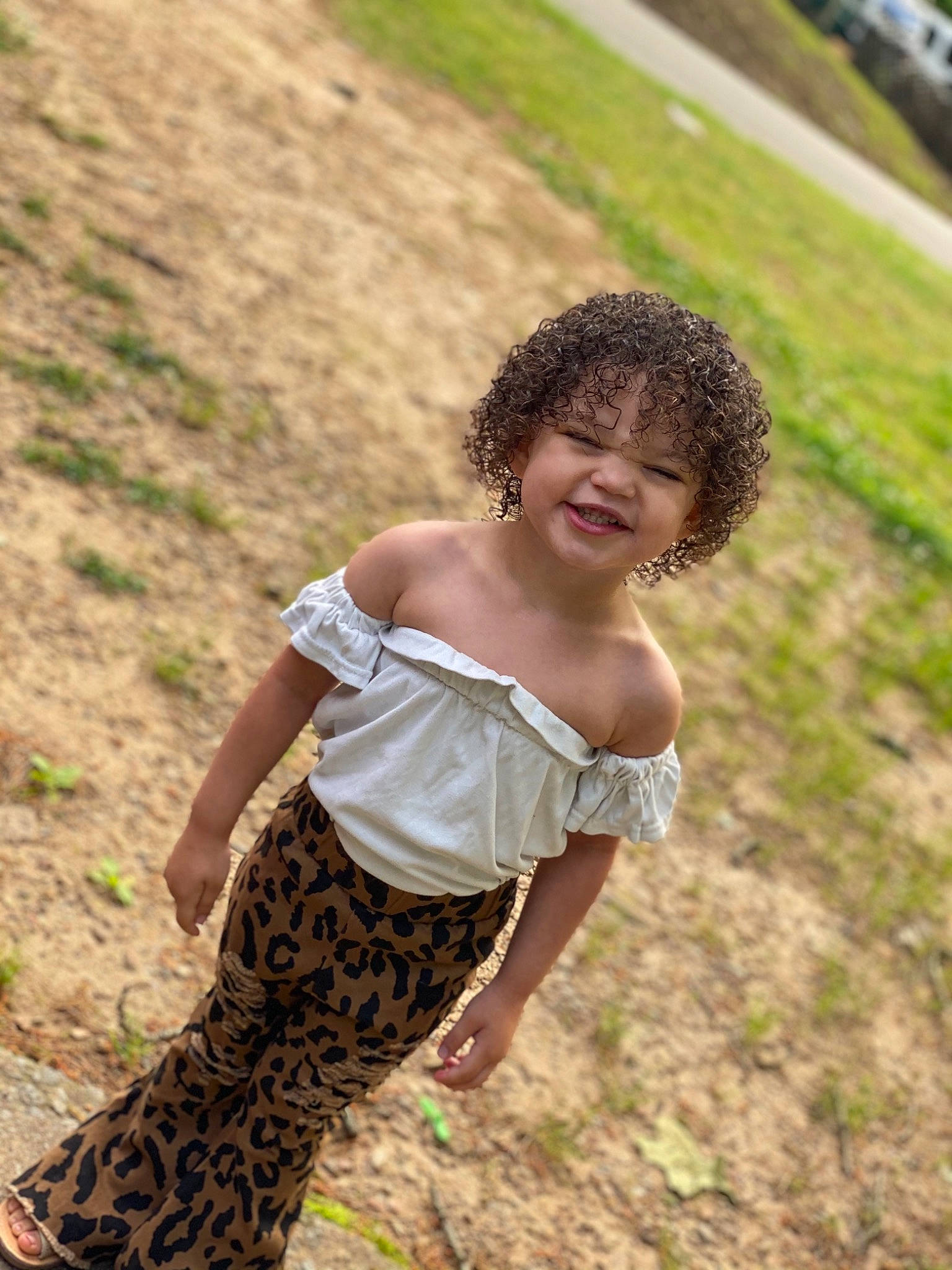 Kyrah is registered to the contest to win money with this photo: black_hair, eyewear, face, fawn, fun, grass, grass_family, grassland, happy, human_leg, joy, landscape, leisure, long_hair, people_in_nature, person, plant, smile, thigh, trunk