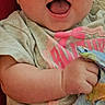 Ainsley joined the competition — help win amazing prizes! baby, smiling, infant, clothing, colorful_cloth, happy, person, face, cute, child, sitting, apparel, shorts, tshirt, skin, indoors, closeup, expression, joy, young