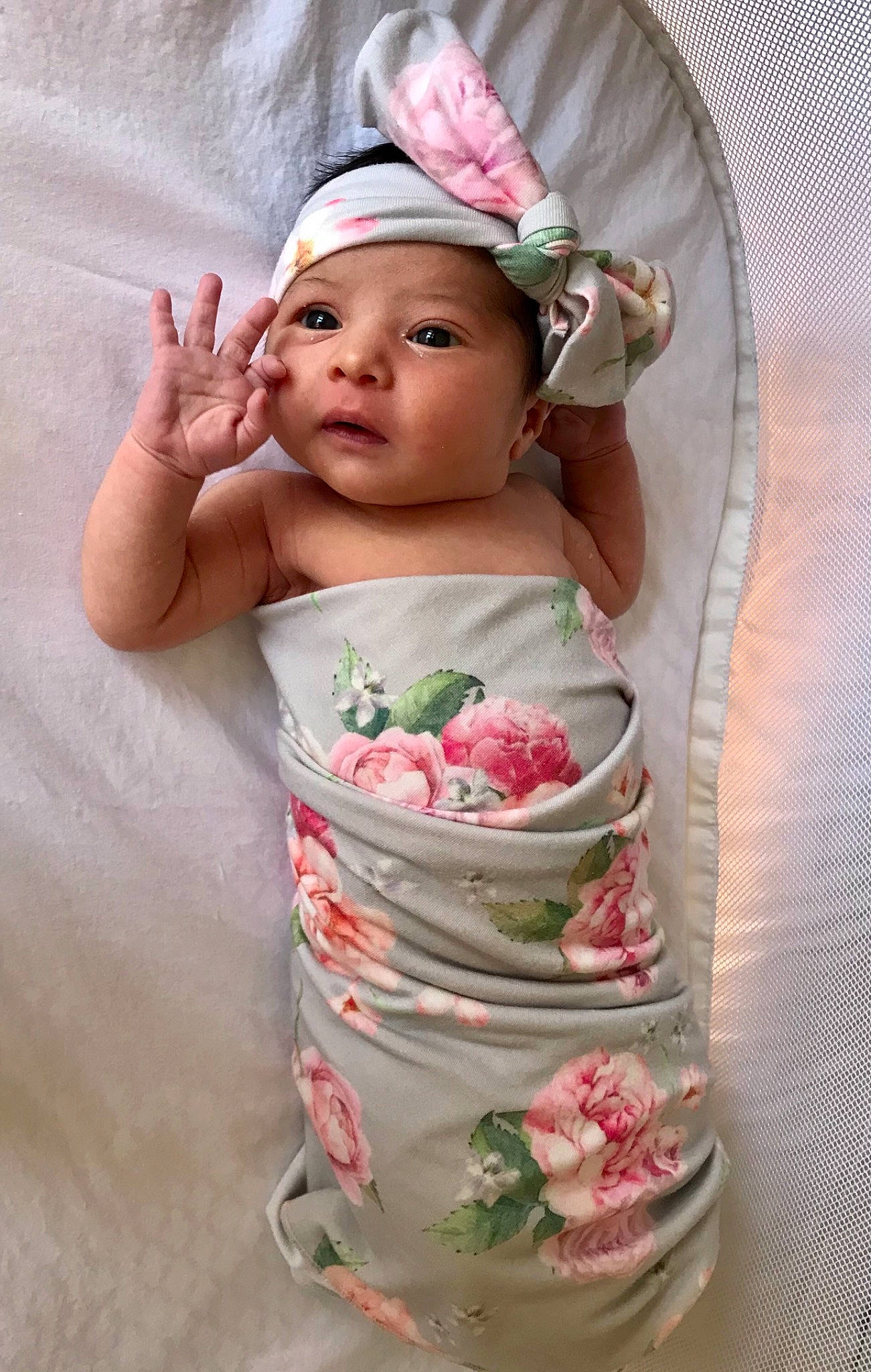 Eva is registered to the contest to win money with this photo: baby, baby_toddler_clothing, ceramic, cheek, child, cut_flowers, dishware, dress, hand, headwear, linens, peach, person, petal, pink, porcelain, rose, serveware, sleeve, sweetness