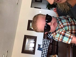 River joined the competition — help win amazing prizes! beard, event, eyelash, eyewear, facial_hair, finger, fun, gesture, hair, jaw, organ, pattern, person, picture_frame, plaid, room, smile, sunglasses, tartan, thumb