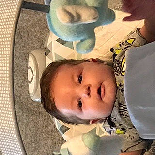River is registered to the contest to win money with this photo: baby, baby_products, cheek, child, chin, ear, eyebrow, eyelash, happy, iris, linens, lip, mammal, mouth, nose, person, skin, textile, toddler, toy