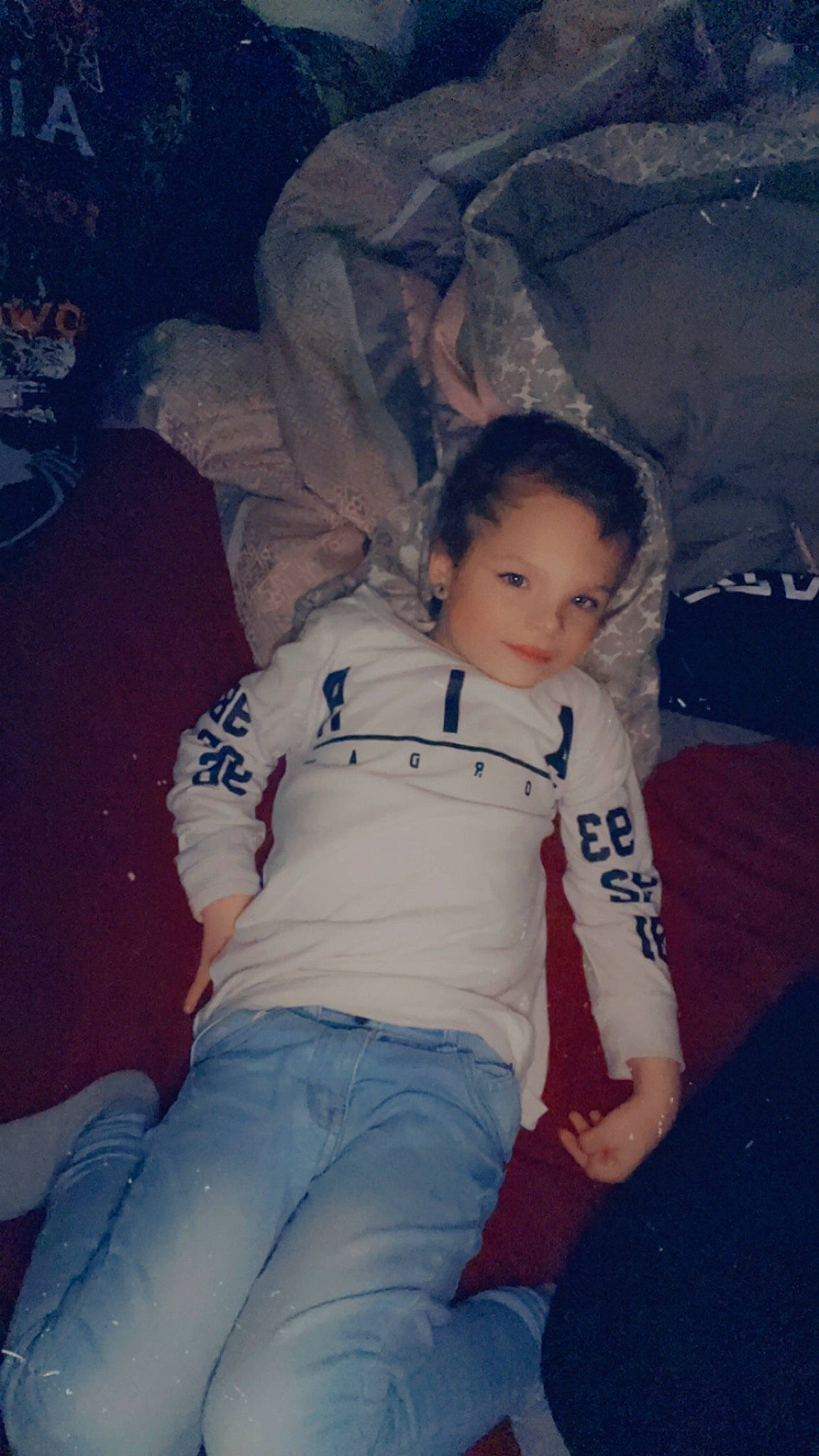 Zavien is registered to the contest to win money with this photo: child, comfort, cool, elbow, electric_blue, flash_photography, fun, happy, human_leg, iris, jeans, joy, lap, leg, long_hair, mouth, person, sitting, thigh, tints_and_shades