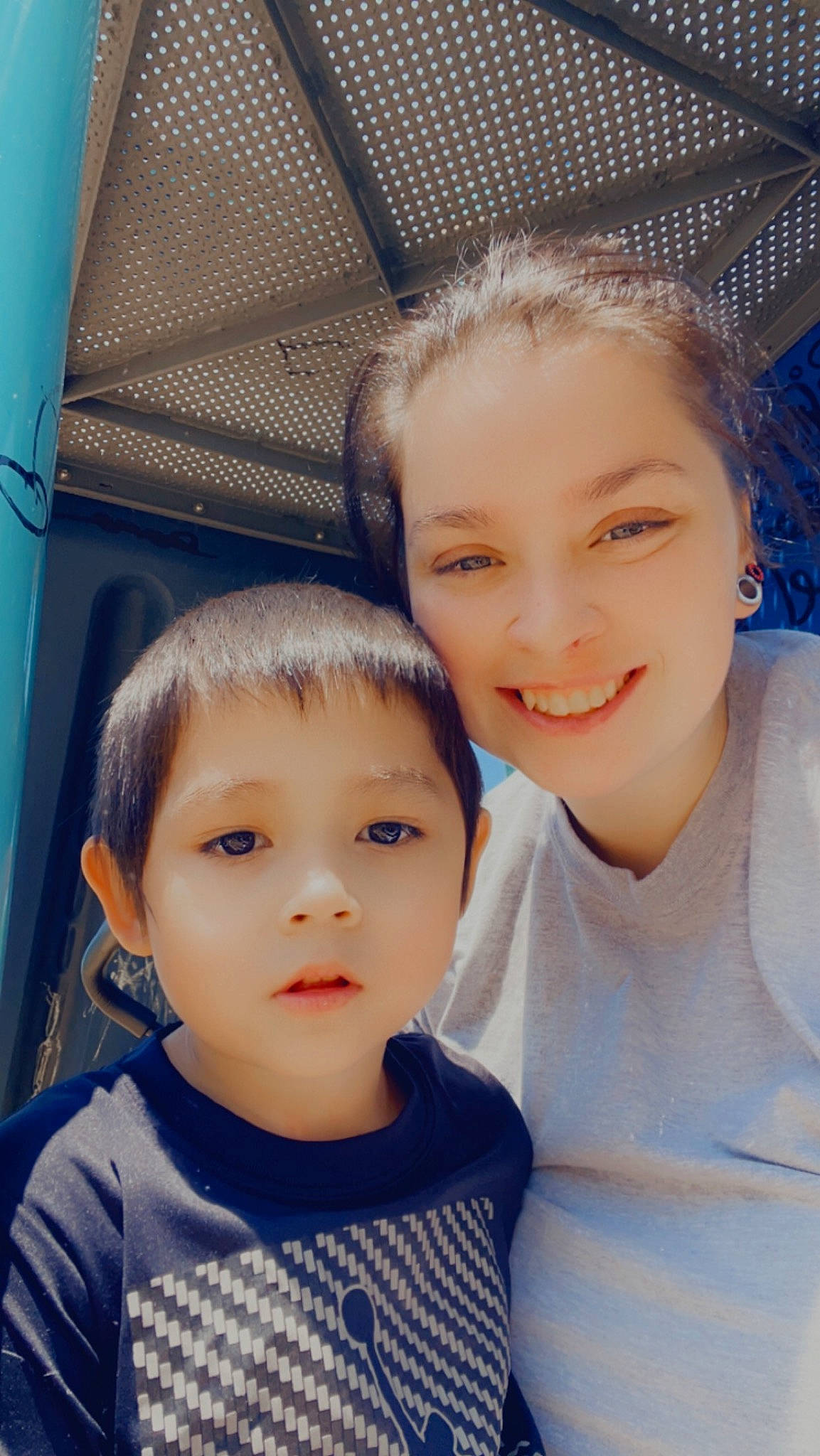 Ziren King is registered to the contest to win money with this photo: cheek, child, chin, cool, eyebrow, eyelash, forehead, fun, happy, hug, iris, joy, leisure, lip, nose, person, selfie, skin, smile, t_shirt