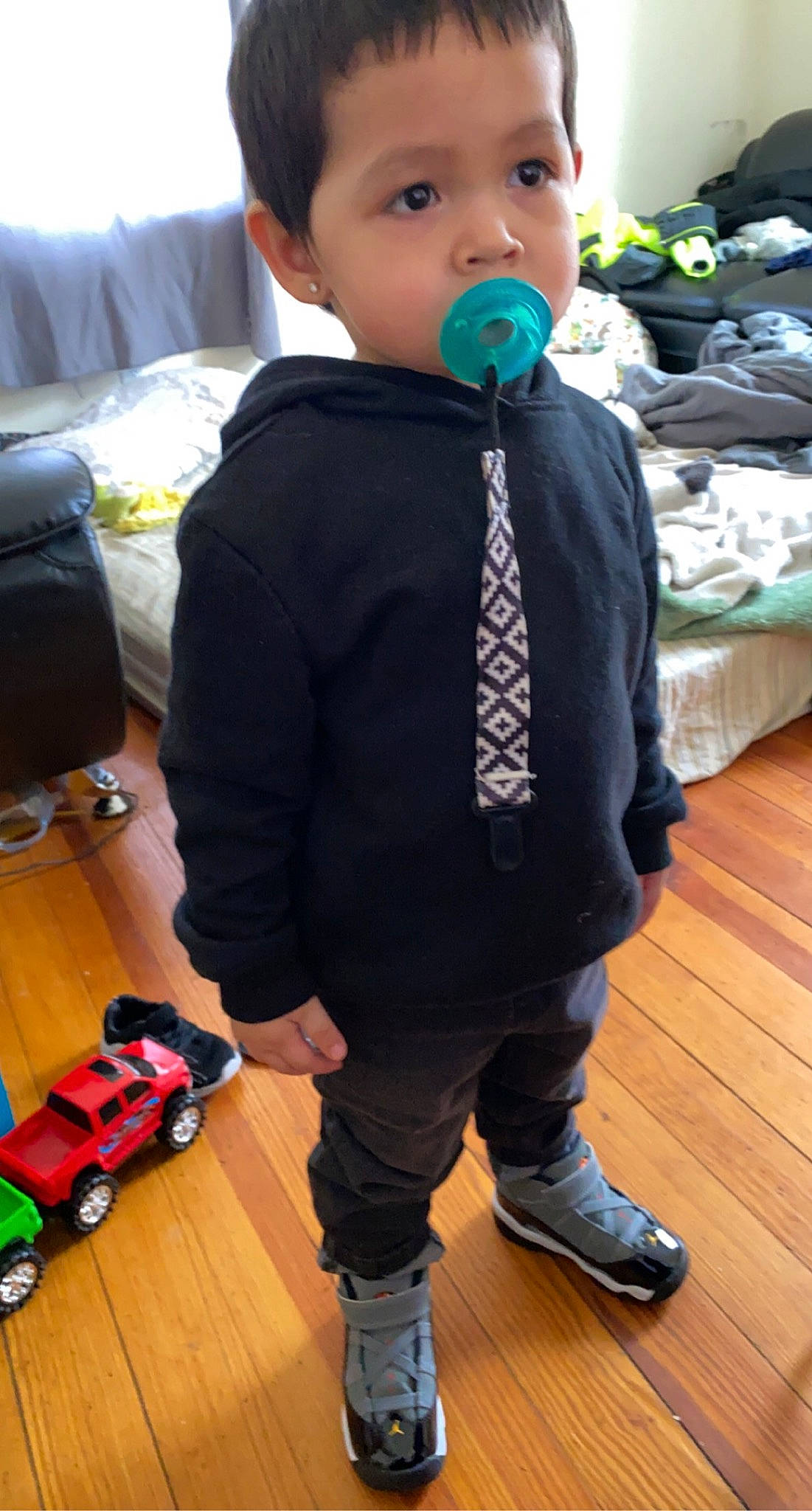 Ziren King is registered to the contest to win money with this photo: baby, baby_toddler_clothing, black, child, event, flooring, formal_wear, green, hardwood, jacket, joint, laminate_flooring, person, sleeve, tie, toddler, toy, white, wood, wood_flooring