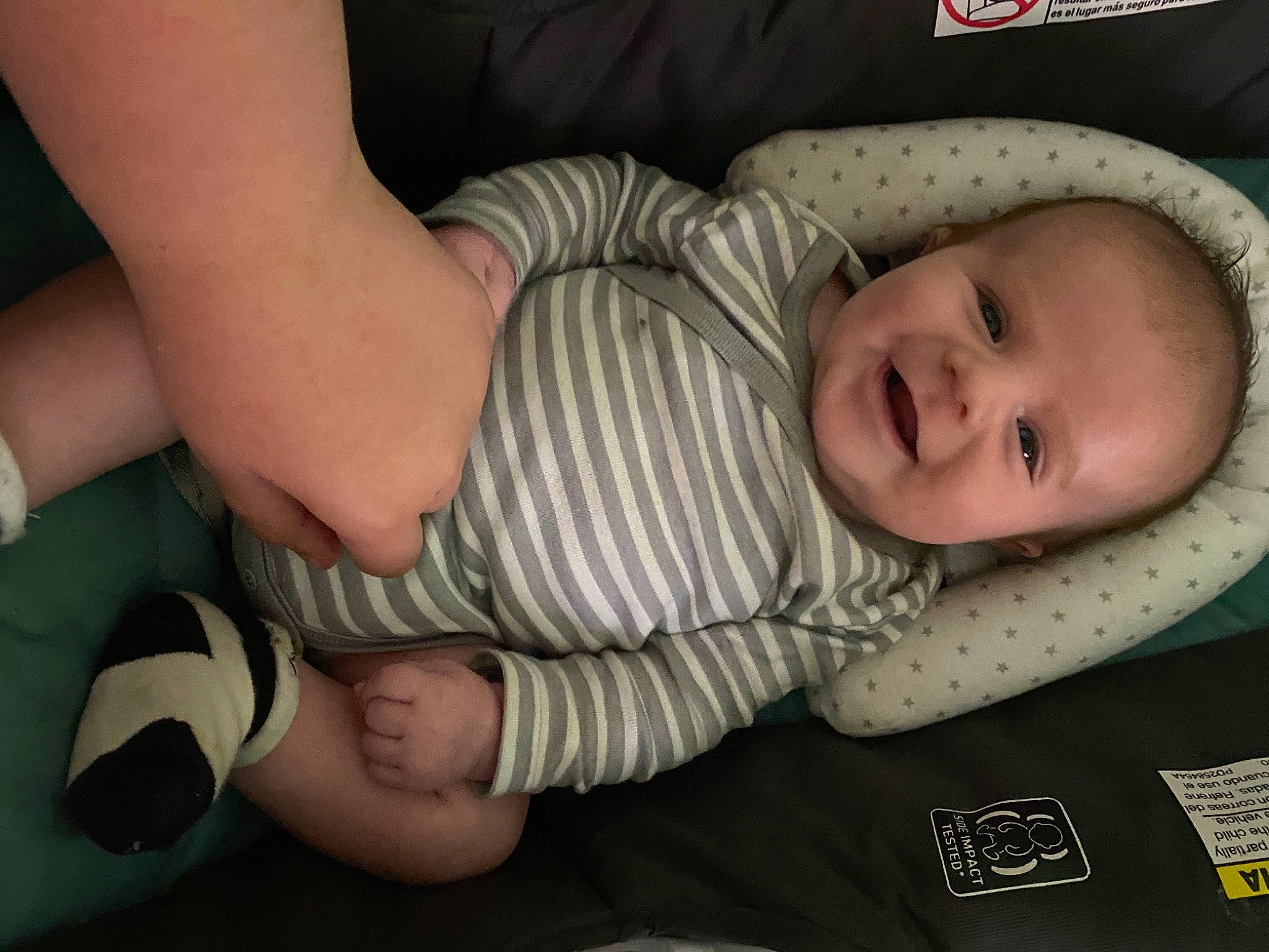 Brexton is registered to the contest to win money with this photo: arm, baby, baby_products, baby_toddler_clothing, cheek, child, comfort, elbow, finger, foot, human_leg, iris, knee, mouth, person, product, skin, sleeve, smile, thigh