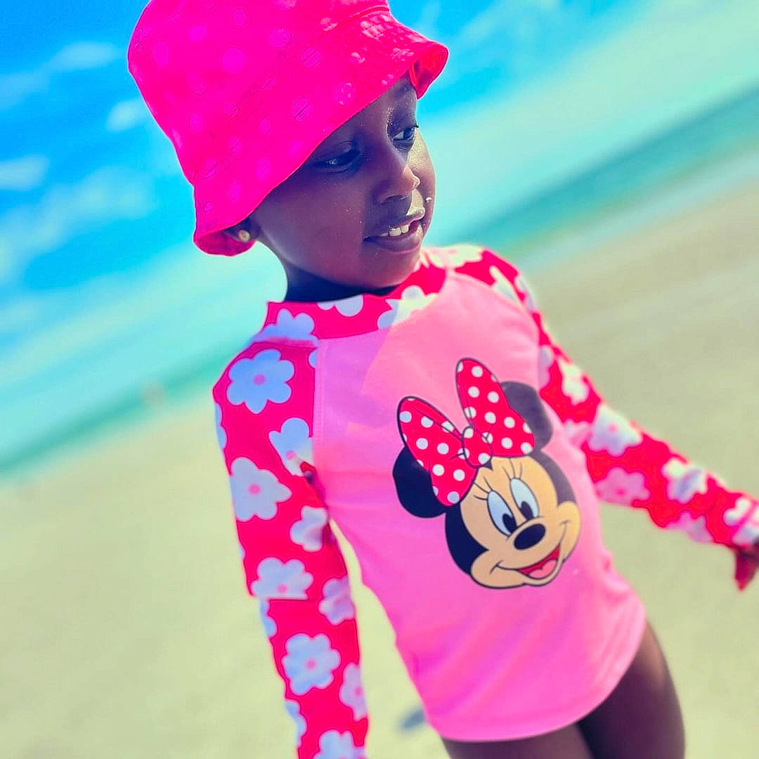 Jhene joined the competition — help win amazing prizes! baby_toddler_clothing, beach, beauty, cap, cool, electric_blue, happy, headgear, headwear, leisure, magenta, pattern, people_in_nature, person, pink, red, sky, sleeve, smile, t_shirt