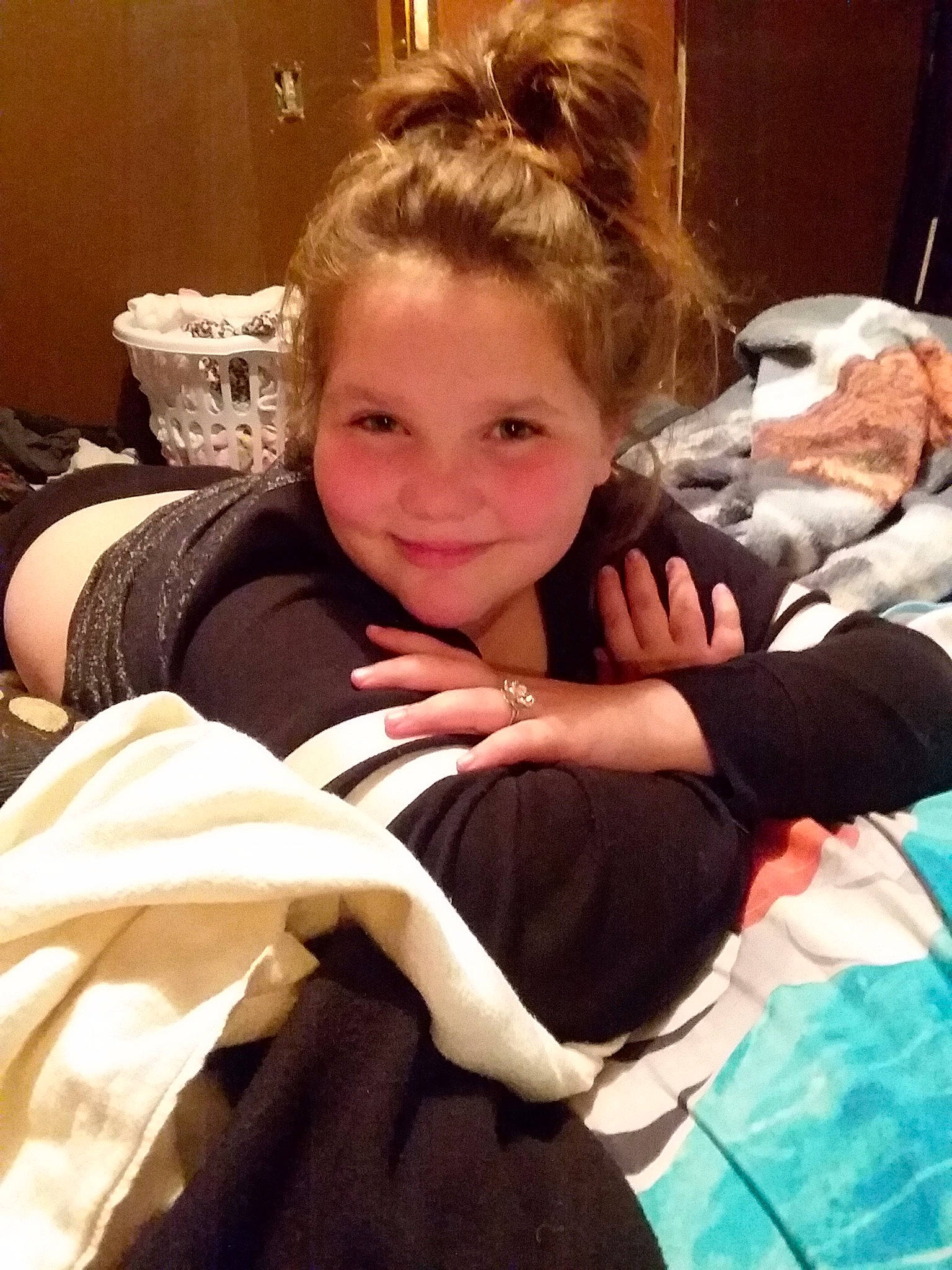 Emilee is registered to the contest to win money with this photo: arm, carnivoran, child, day, dog_like_mammal, ear, girl, hair, head, human_hair_color, joy, mammal, mouth, organ, person, product, skin, smile, toddler, vertebrate