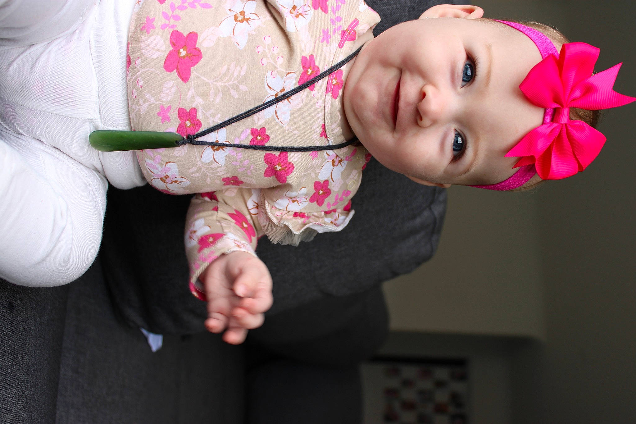 Amaia is registered to the contest to win money with this photo: arm, baby, baby_toddler_clothing, carmine, cheek, child, eye, face, flash_photography, fun, hand, happy, headwear, joy, lip, magenta, person, pink, skin, sleeve