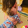 Robert joined the competition — help win amazing prizes! child, baby, hug, pajamas, trucks, carpet, indoor, affection, love, toddler, caring, family, sibling, cute, comfort, young_child, playful, warmth, home, smile