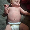baby, infant, sleeping, diaper, skin, arm, hand, face, peaceful, rest, cute, chubby, newborn, lying_down, child, soft_light, indoors, body, head, relaxed