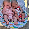Ava joined the competition — help win amazing prizes! baby, babies, infant, sleeping, onesie, superman, pink_clothing, baby_rocker, colorful, outdoor, cute, together, peaceful, newborn, child, portrait, feet, hand, face, nap
