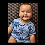 Dylan joined the competition — help win amazing prizes! baby, blue_clothing, child, closeup, cute, dinosaur_pattern, eyes, face, happy, head, indoor, infant, onesie, portrait, short_hair, sitting, skin, smiling, woven_background, young_child