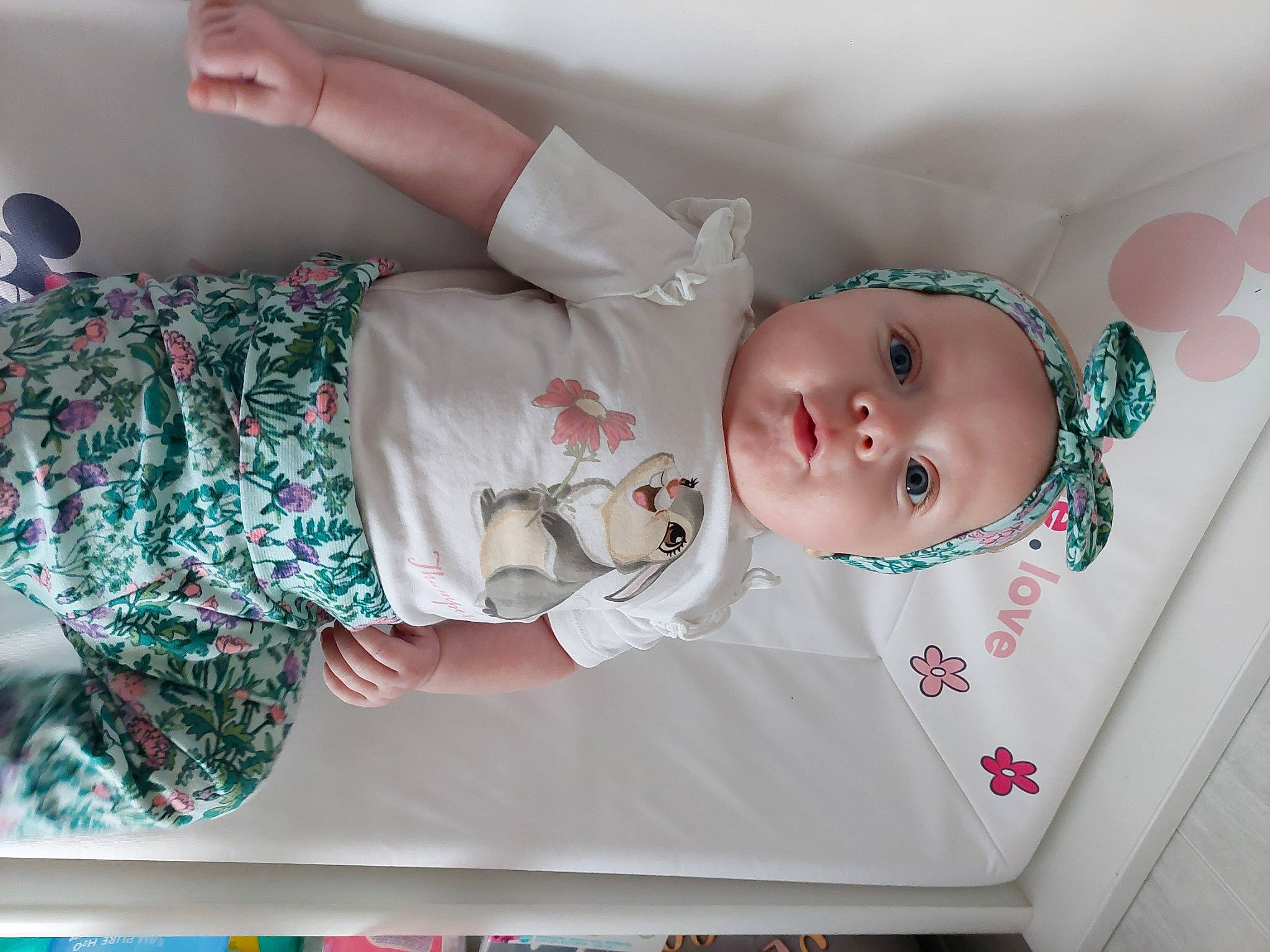 Yliana participe au concours pour gagner de l'argent avec cette photo : arm, baby, baby_products, baby_toddler_clothing, beauty, child, clothing, comfort, dress, facial_expression, hand, human_body, mammal, pattern, person, pink, product, skin, sleeve, textile