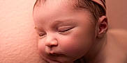 Palmer is registered to the contest to win money with this photo: newborn, baby, sleeping, headband, flower, closeup, soft, peach, blanket, peaceful, infant, skin, portrait, cute, resting, child, tiny, hands, face, delicate