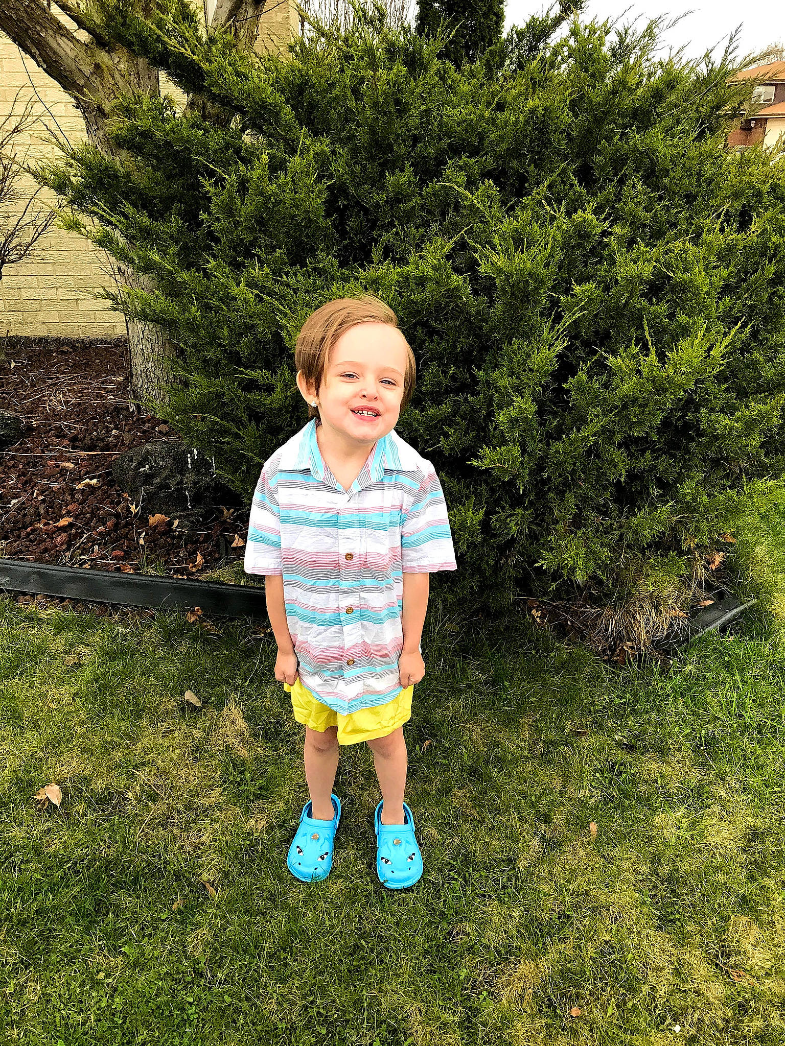 Emmaleigh is registered to the contest to win money with this photo: baby_toddler_clothing, backyard, child, garden, human, joy, lawn, pattern, people_in_nature, person, shrub, sleeve, toddler, yard