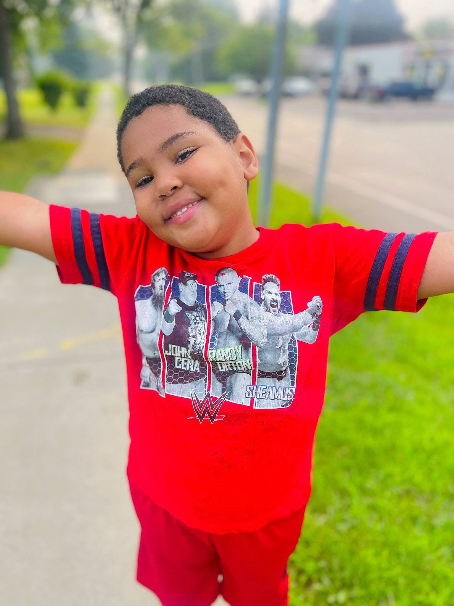 Desmond joined the competition — help win amazing prizes! anger, child, chin, flash_photography, fun, gesture, grass, happy, human_body, joy, leisure, neck, person, play, recreation, shoulder, sleeve, smile, sportswear, t_shirt