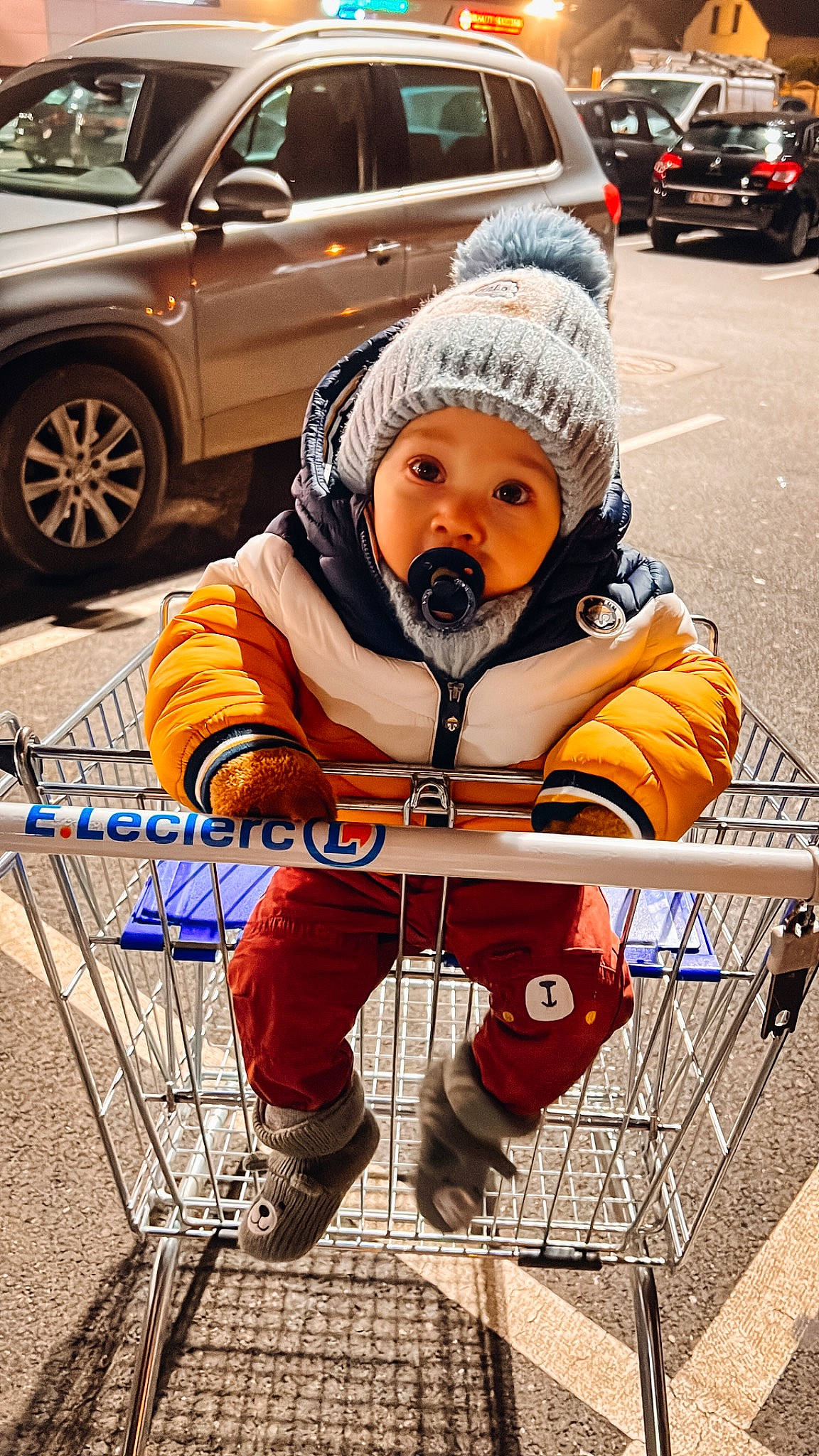 Adam participe au concours pour gagner de l'argent avec cette photo : asphalt, automotive_design, automotive_lighting, automotive_tire, cap, car, headwear, jacket, land_vehicle, motor_vehicle, person, personal_luxury_car, personal_protective_equipment, photograph, plant, snapshot, sneakers, tire, toddler, vehicle