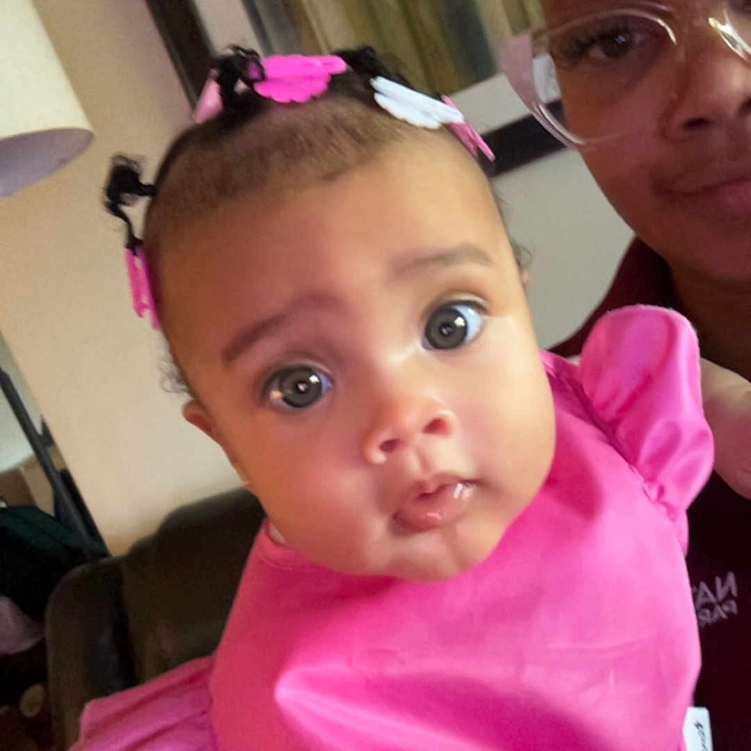 Autumn joined the competition — help win amazing prizes! adult, baby, casual, child, closeup, curious_expression, face, framed_picture, glasses, hair_clips, holding, home, indoor, lamp, large_eyes, person, pink_clothing, portrait, sofa, woman