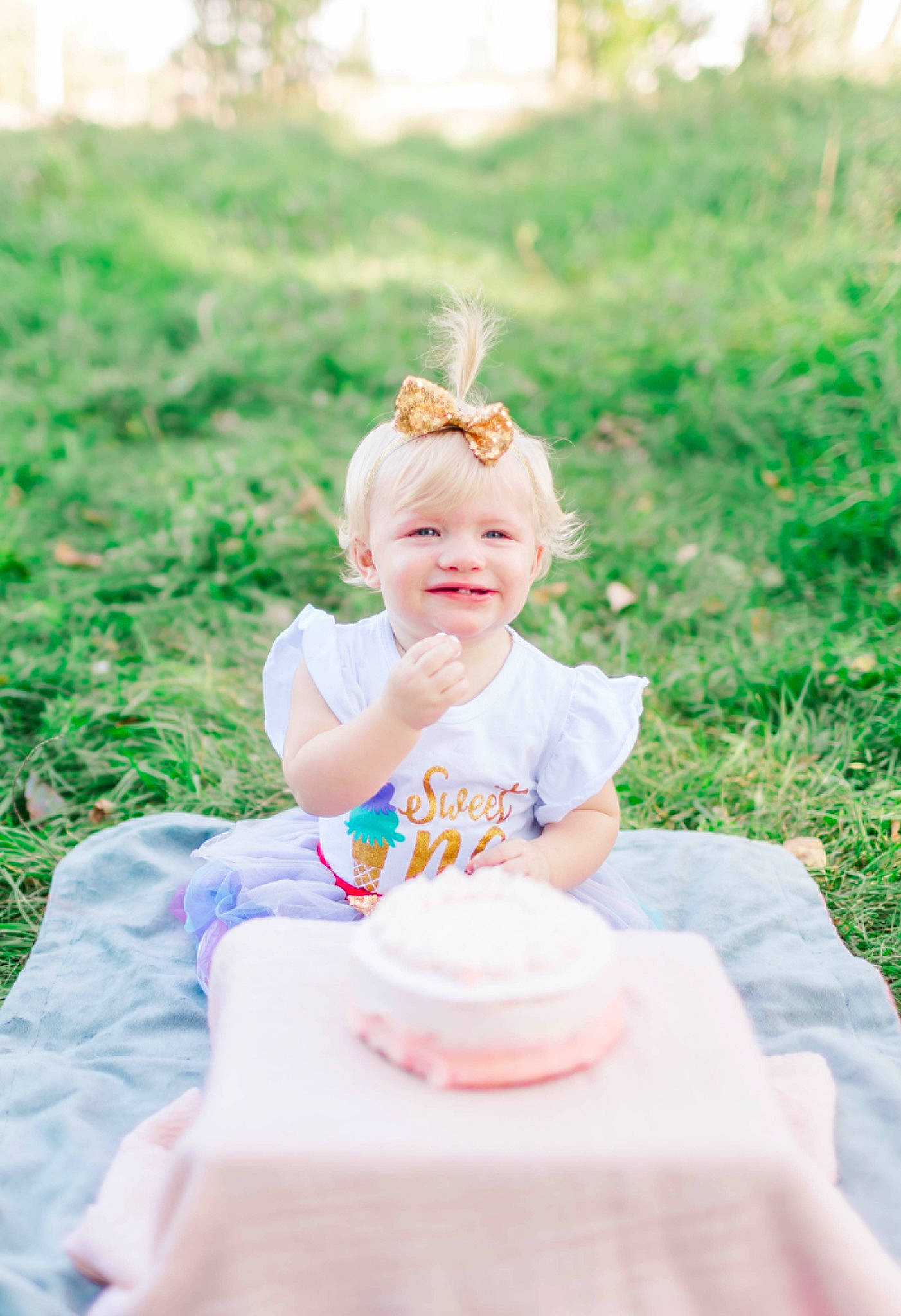 Kennedi joined the competition — help win amazing prizes! baby, child, dress, event, eye, flash_photography, fun, grass, grassland, green, happy, joy, leisure, people_in_nature, person, pink, plant, recreation, smile, table