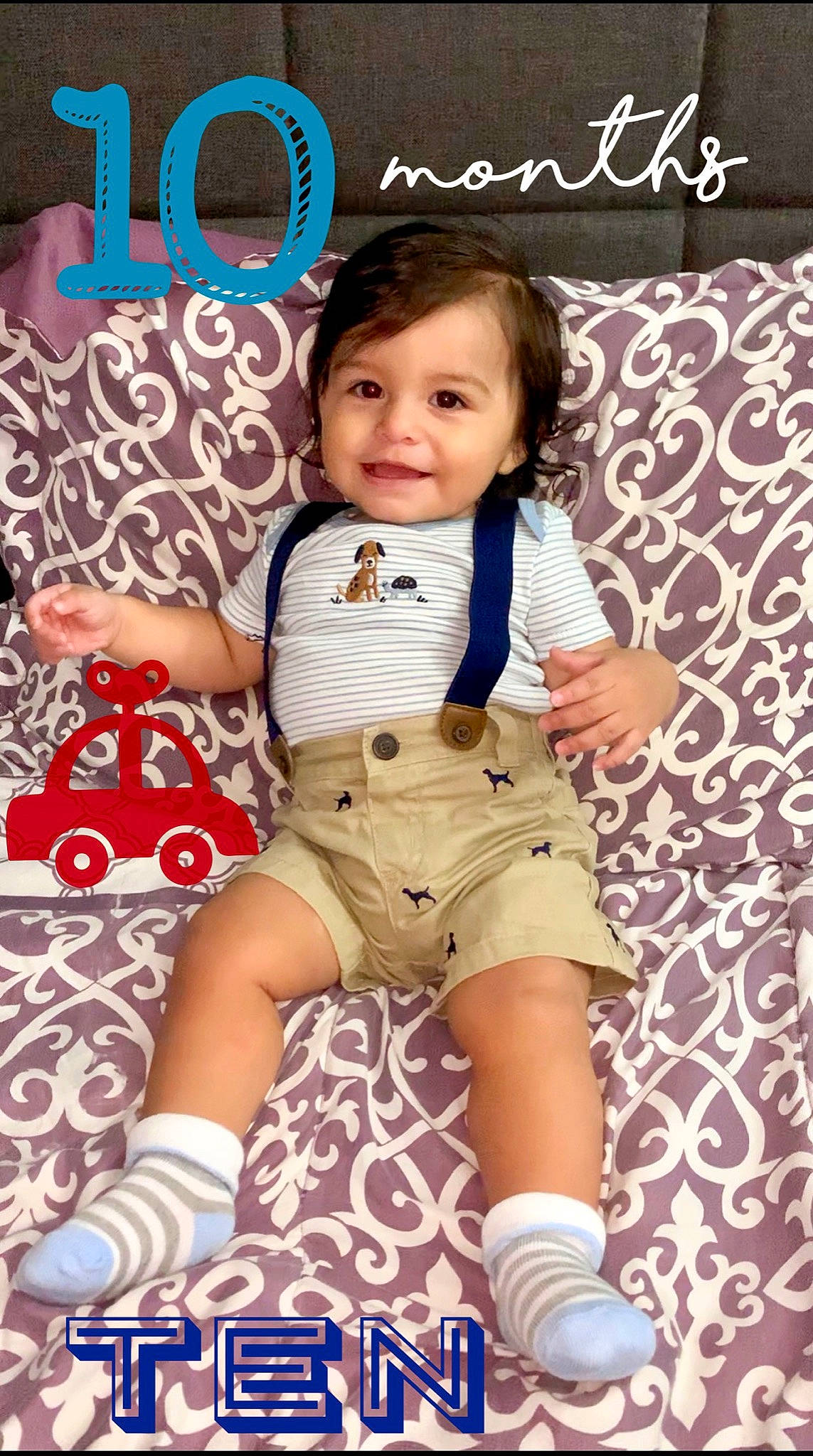 Christopher is registered to the contest to win money with this photo: baby, baby_toddler_clothing, child, eye, face, finger, happy, head, joy, leg, neck, pattern, person, pink, product, skin, sleeve, smile, t_shirt, textile