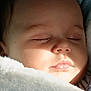Samuel a rejoint le concours — aidez-le/la à gagner de superbes lots ! baby, infant, sleeping, blanket, close_up, portrait, face, cheeks, lips, eyelashes, bedding, fur_blanket, soft_texture, nap, sunlight, shadow, peaceful, adorable, cute, newborn