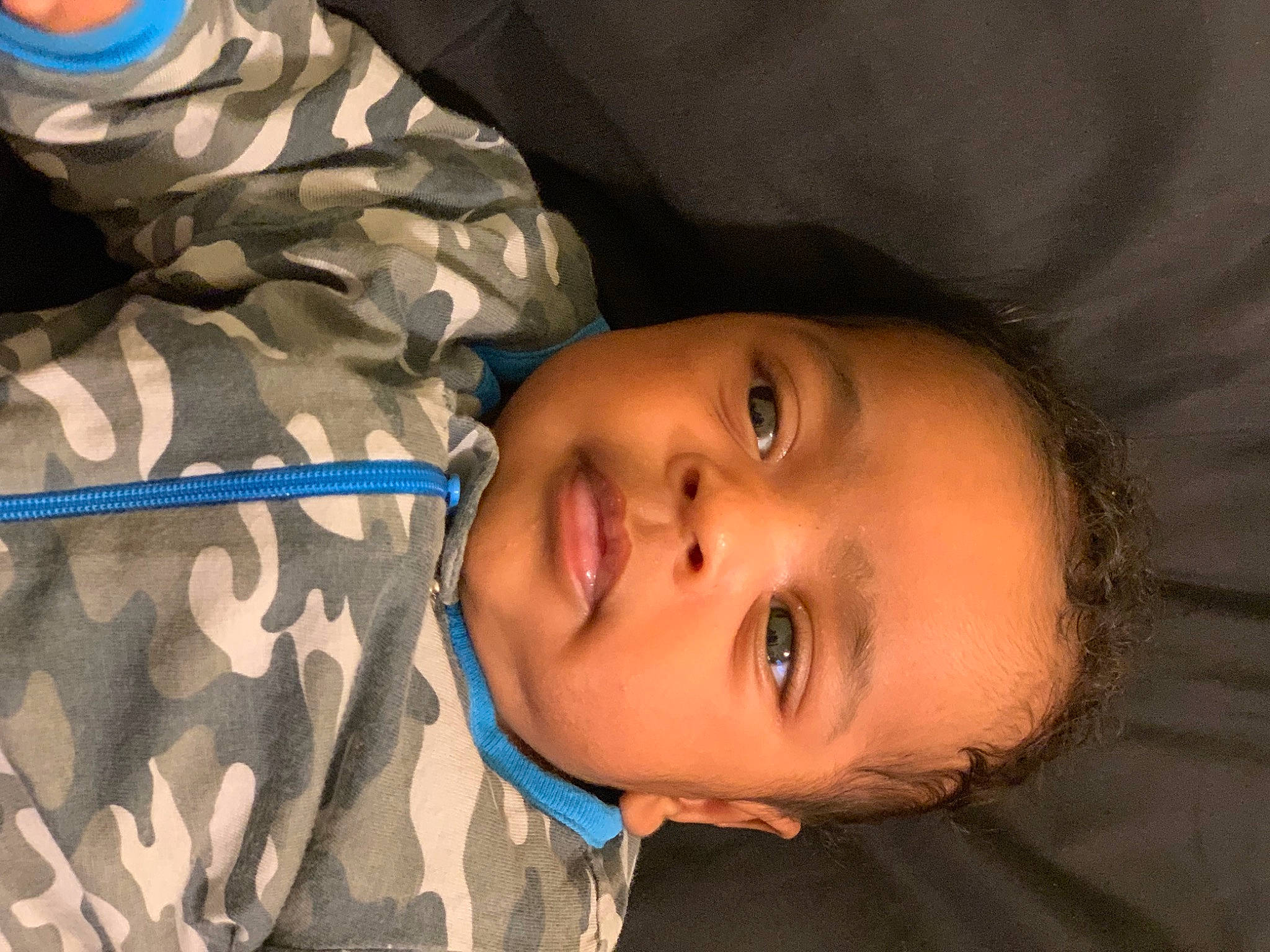 King is registered to the contest to win money with this photo: baby, cheek, child, comfort, eyebrow, eyelash, flash_photography, forehead, happy, iris, lip, mammal, mouth, neck, nose, person, skin, sleeve, smile, toddler