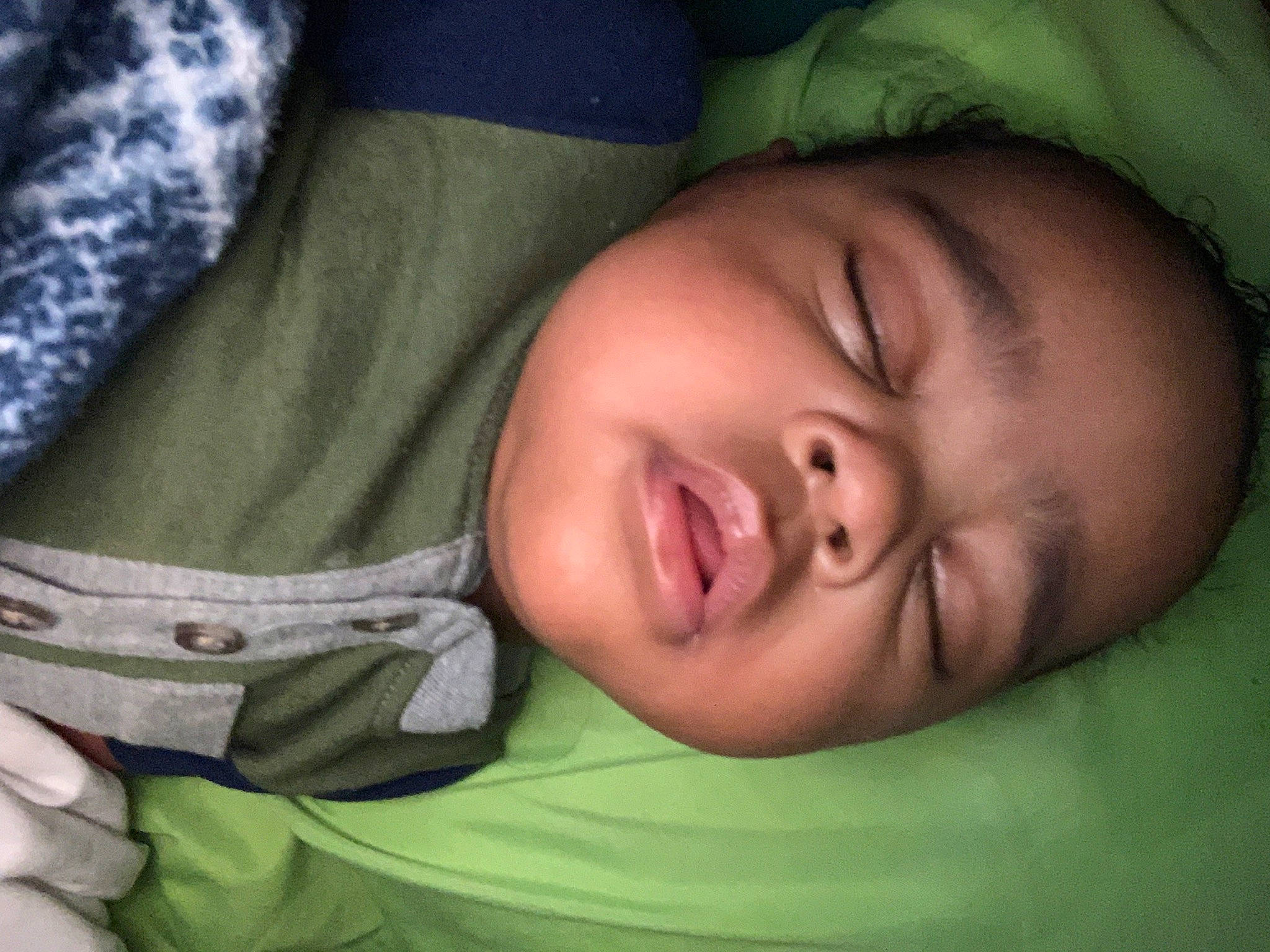 King is registered to the contest to win money with this photo: baby, baby_toddler_clothing, cheek, child, chin, comfort, ear, eyebrow, eyelash, finger, forehead, grass, human_body, iris, lip, mouth, nose, person, skin, sleeve