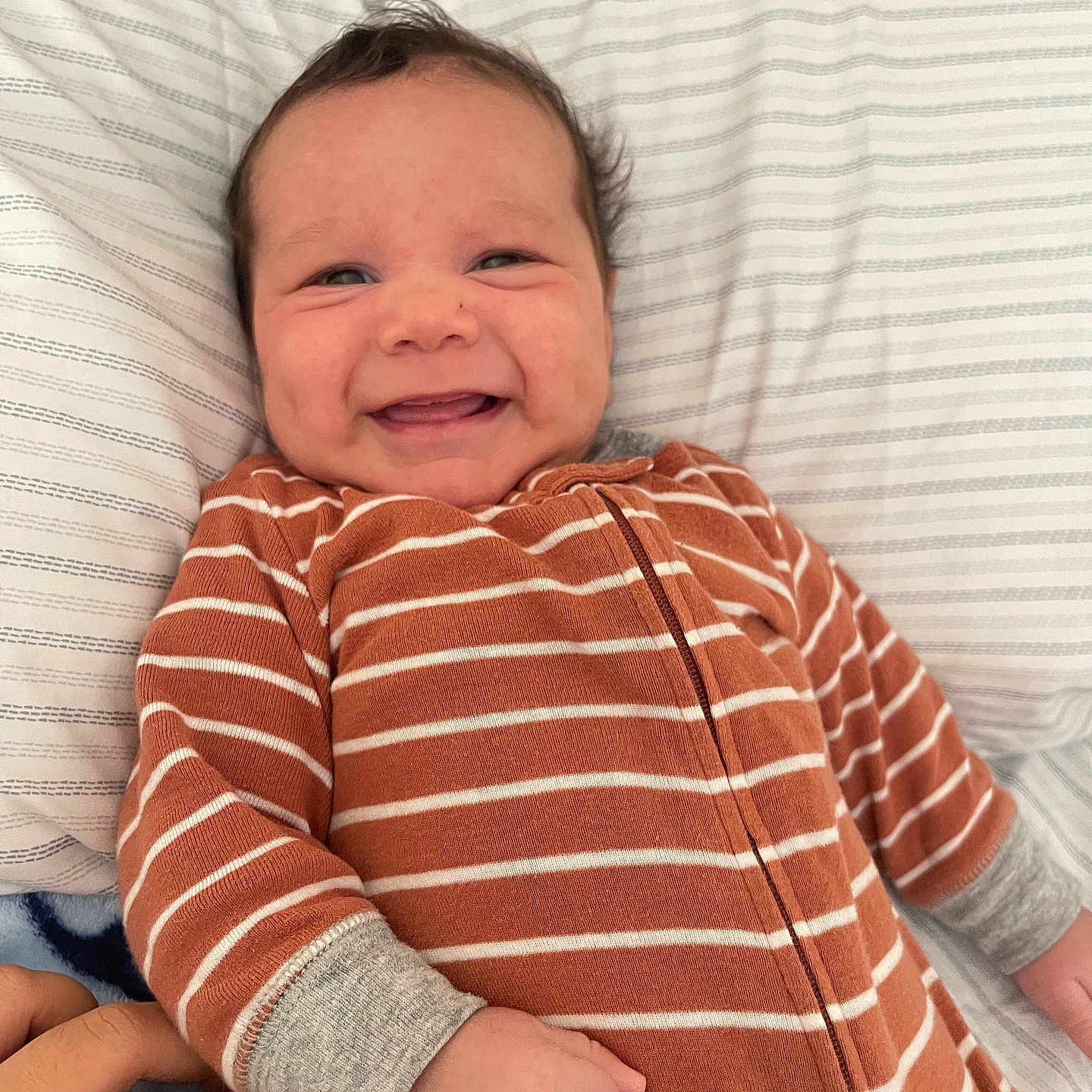 Jahziel is registered to the contest to win money with this photo: baby, babylaughing, bed, blanket, clothing, cushion, face, furniture, happy, head, homedecor, laughing, newborn, pants, person, photography, portrait, quilt, smile, t_shirt